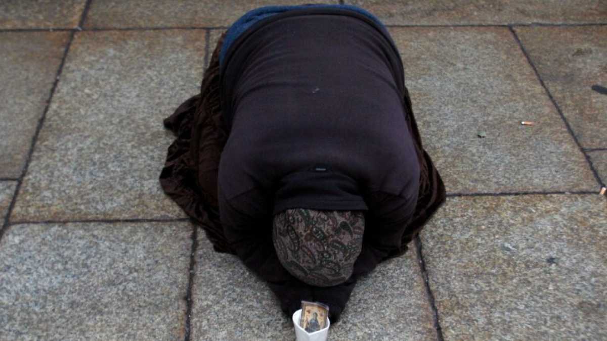 Immagine di Derubare i mendicanti