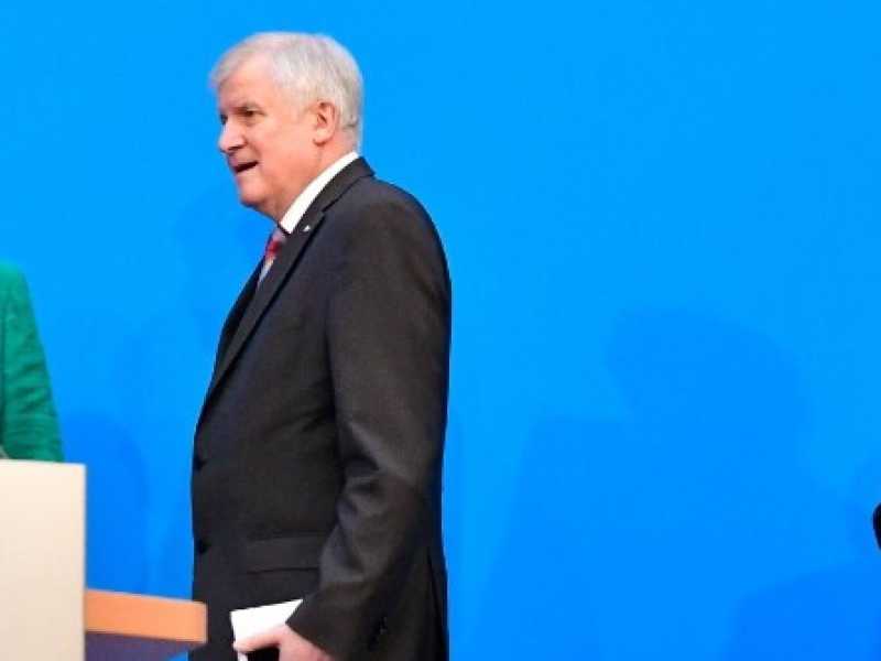 Horst Seehofer, Angela Merkel e Martin Schulz. Foto LaPresse