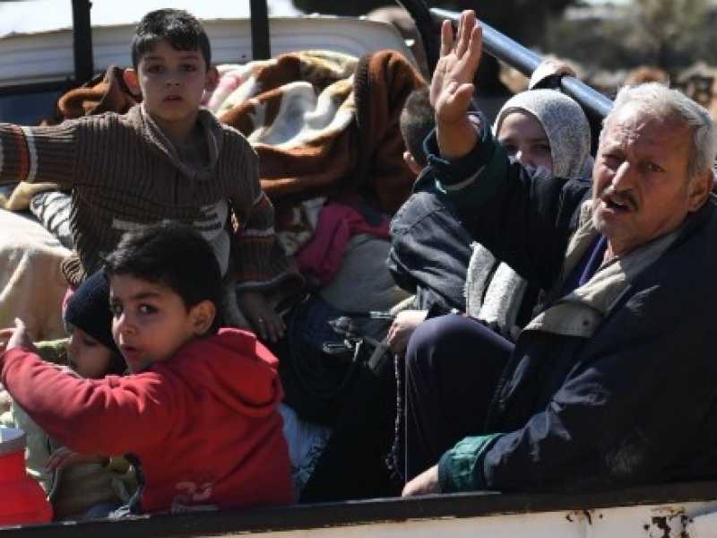 Curdi in fuga da Afrin. Foto LaPresse