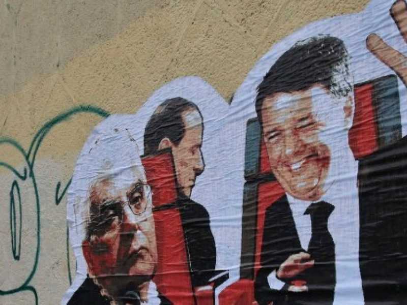 Un'opera di street art che ritrae Sergio Mattarella, Matteo Renzi e Silvio Berlusconi