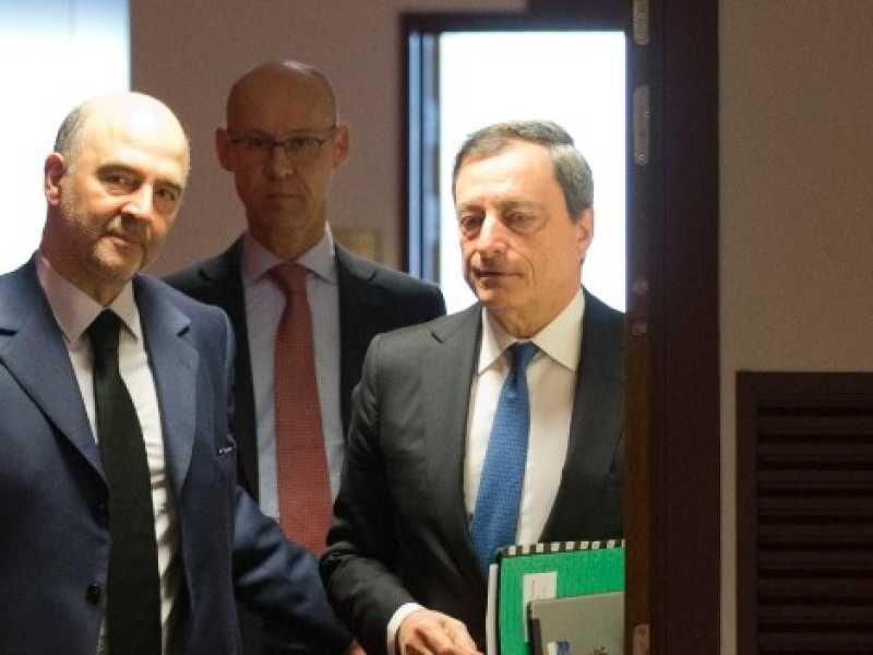 Pierre Moscovici e Mario Draghi (foto Imagoeconomica)
