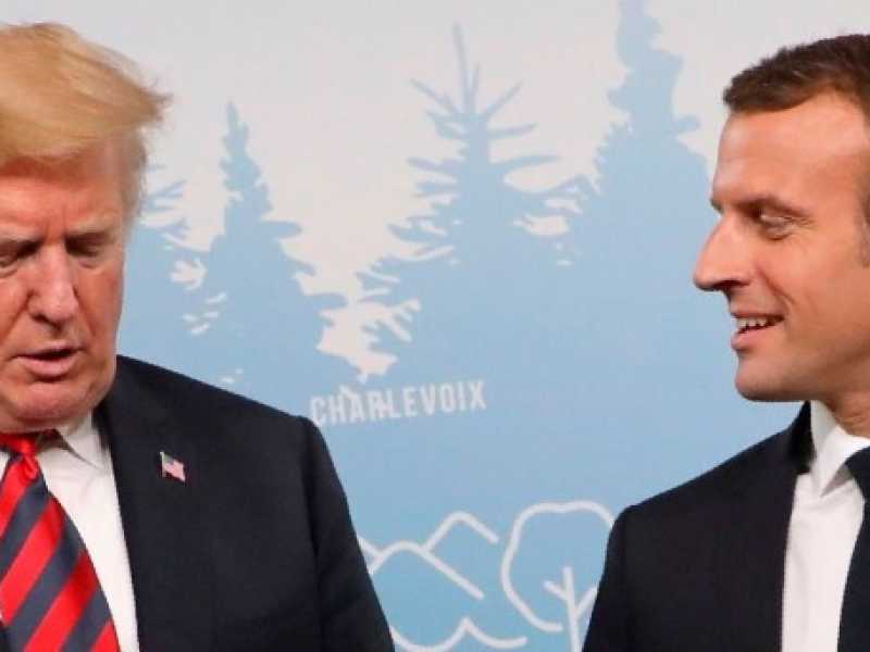 Donald Trump con Emmanuel Macron (Foto LaPresse)