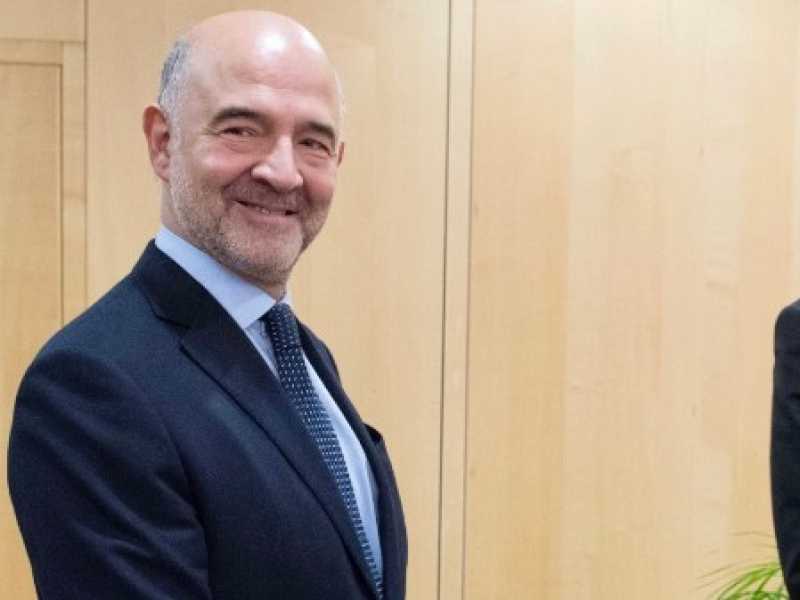 Moscovici con Conte e Tria sabato scorso a Bruxelles. Foto LaPresse