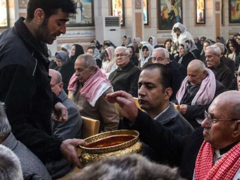 La messa in una chiesa ortodossa siriaca a Derik in Turchia (Foto LaPresse)