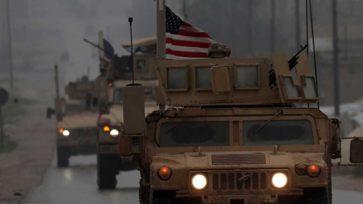 Immagine di Trump, resta in Siria!