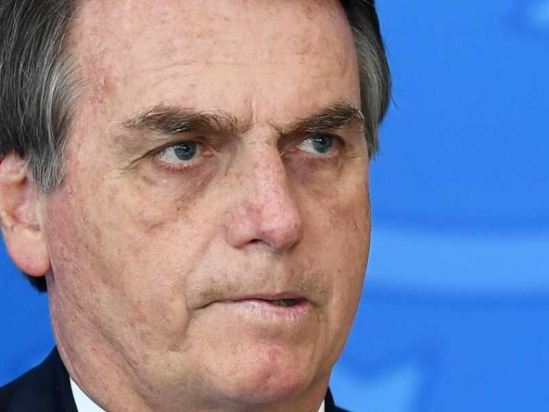 Il presidente brasiliano Jair Bolsonaro durante la cerimonia di commemorazione del National Volunteer Day a Brasilia (foto LaPresse)