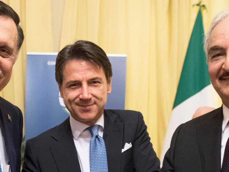Fayez al Serraj, Giuseppe Conte e Khalifa Haftar (foto LaPresse)