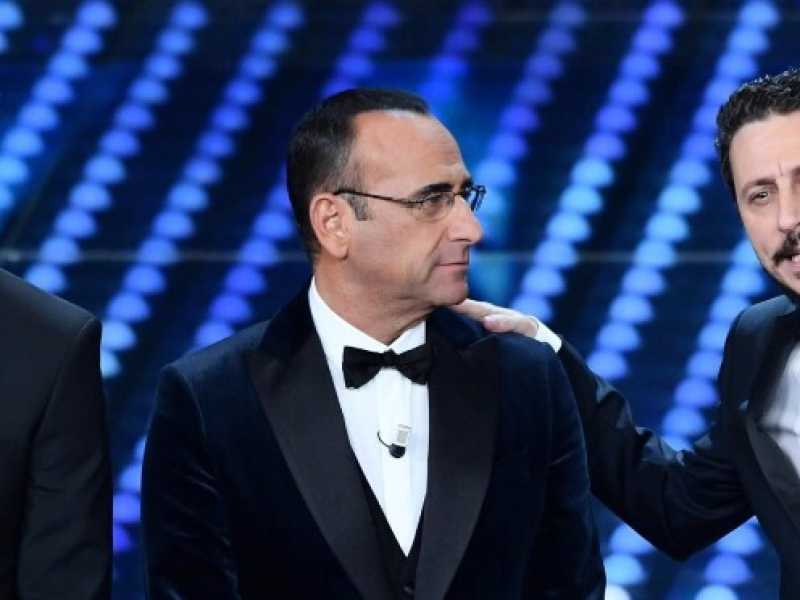 Luca e Paolo con Carlo Conti (foto LaPresse)