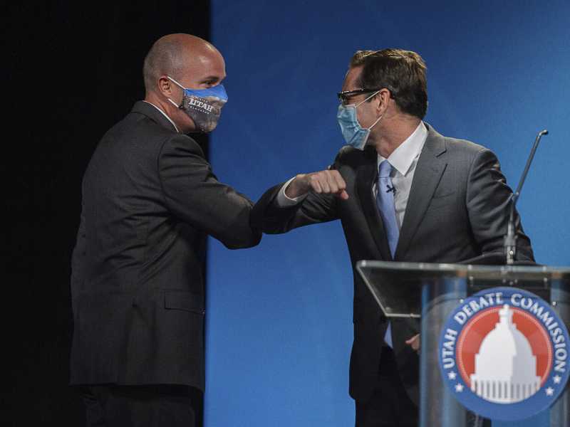 Spencer Cox e Chris Peterson (Trent Nelson/The Salt Lake Tribune, via AP, Pool) <br />