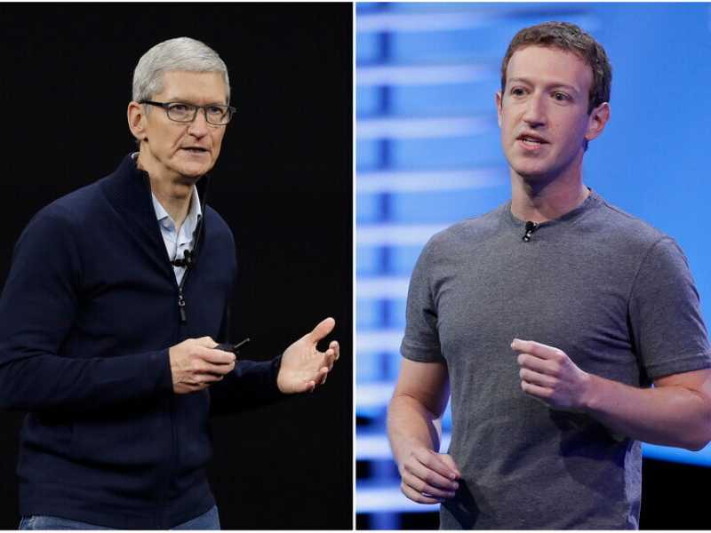 Tim Cook e Mark Zuckerberg (AP Photo/Eric Risberg)