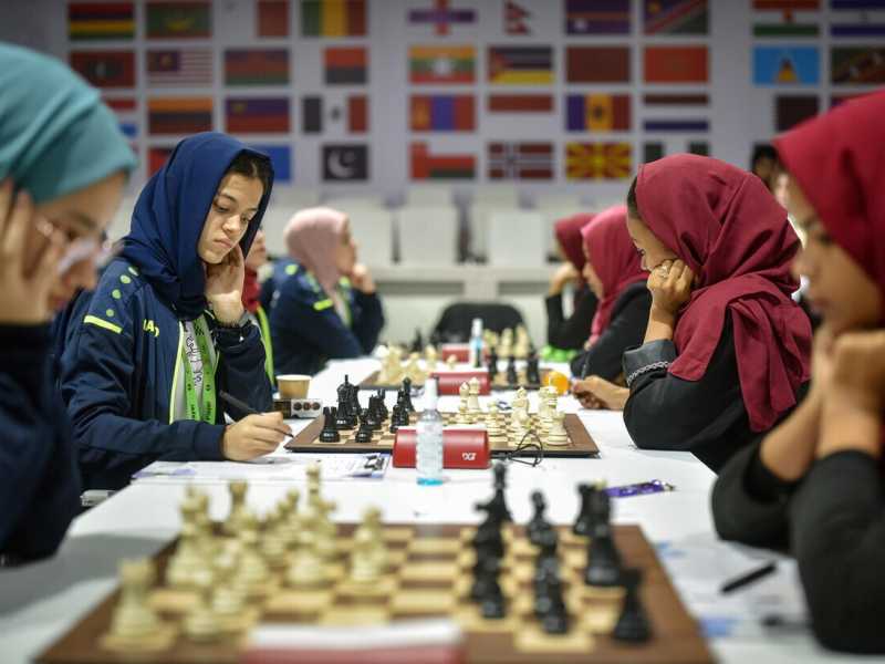 Giocatrici impegnate alle Olimpiadi degli scacchi che si sono svolte in luglio in India (foto Ansa) <br />
