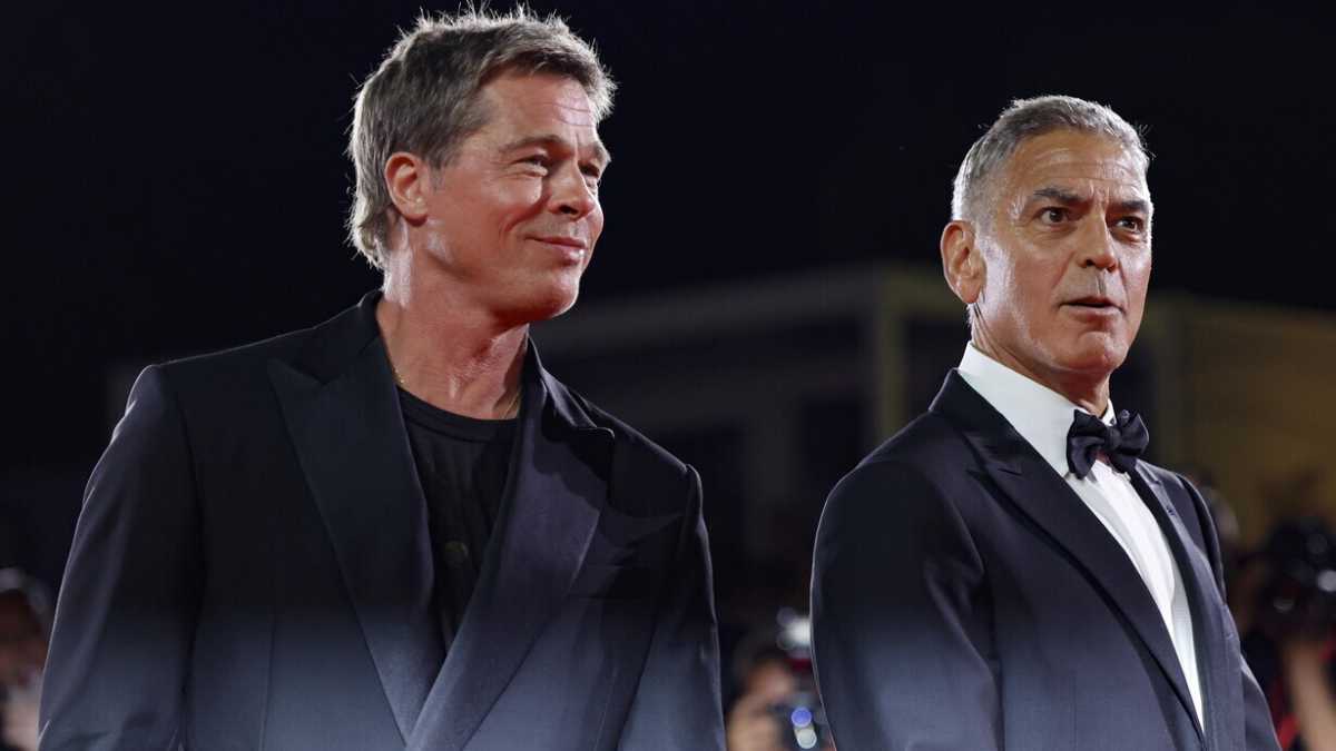 Immagine di La sfilata di Clooney e Pitt a Venezia riporta in auge l'avanspettacolo