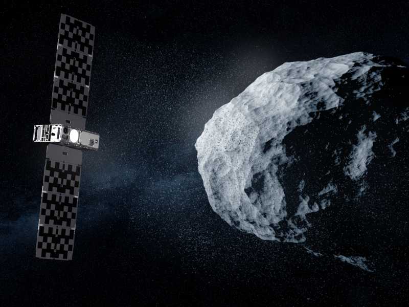 Una elaborazione grafica mostra il CubeSat Milani mentre svolge uno dei suoi compiti principali: studiare le particelle di polvere di asteroidi (ESA-Science Office)<br />