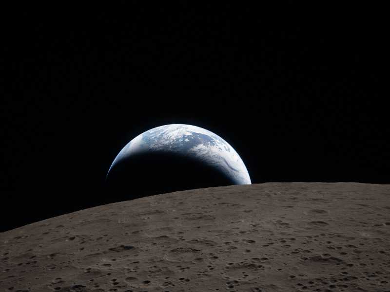 La che Terra tramonta vista attraverso il finestrino della navicella spaziale Orion il 6 aprile 2026, durante il sorvolo della Luna da parte dell'equipaggio di Artemis II (Nasa via GettyImages)