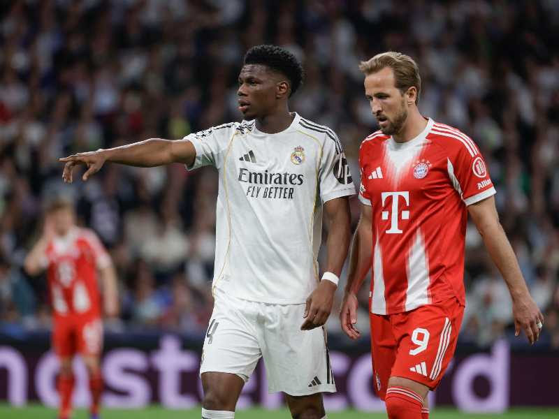 Aurelien Tchouameni e Harry Kane durante i quarti di finale di Champions League. Foto Ansa