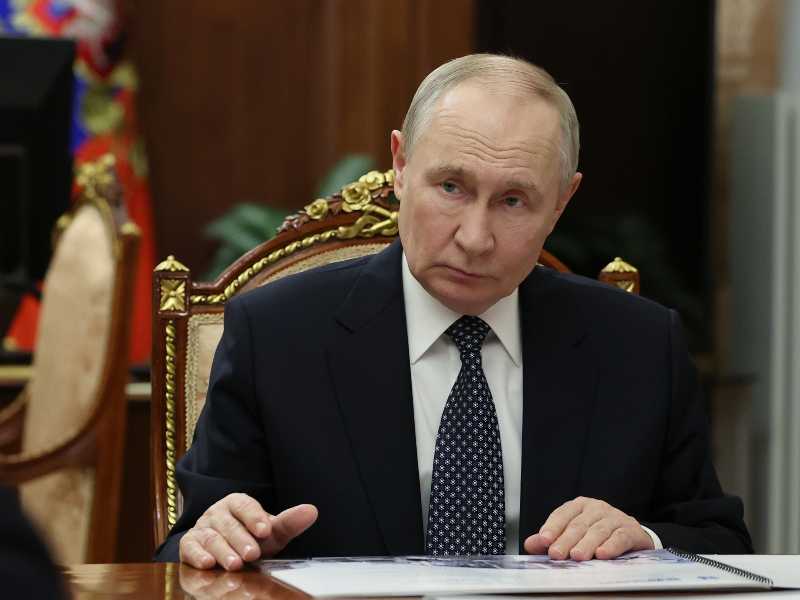 Alexander Kazakov/Sputnik, Kremlin Pool Photo via AP