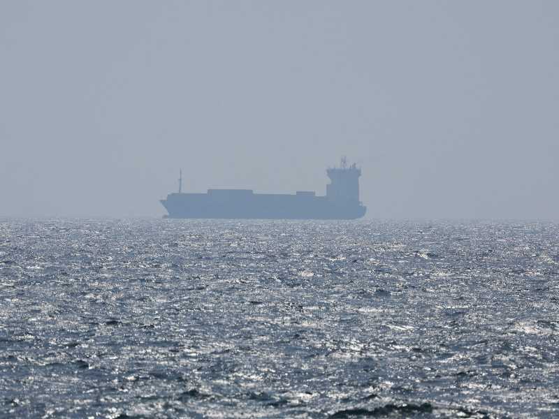 epa12192585 A container ship sails on the Strait of Hormuz, as seen from Ras Al Khaimah, United Arab Emirates, 23 June 2025. The Strait lies between Oman and Iran and links the Gulf to the Arabian Sea. The Iranian parliament approved a measure to close the Strait of Hormuz, following US strikes on three of Iran's key nuclear sites on 22 June 2025. Israel and Iran have been exchanging fire since Israel launched strikes across Iran on 13 June 2025. EPA/ALI HAIDER